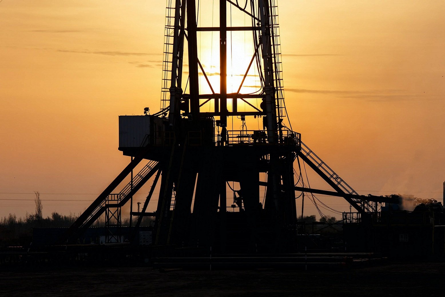 Oil rig at sunset - oil and gas equipment
