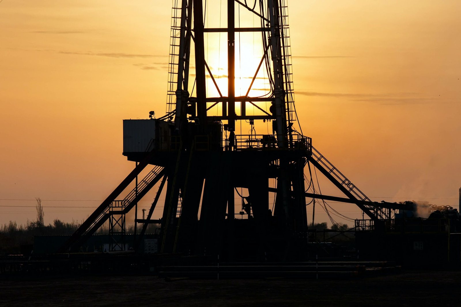 Oil rig at sunset - oil and gas equipment